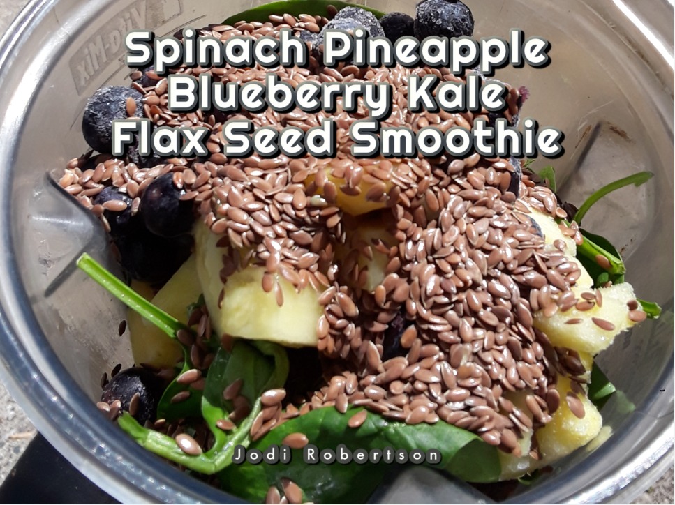 Spinach Pineapple Blueberry Kale Flax Seed before the blend