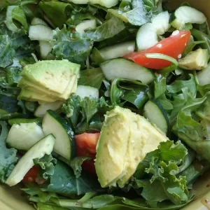 Panera-Inspired Seasonal Greens Salad with arugula, avocado, cucumber, tomato, and balsamic vinaigrette.