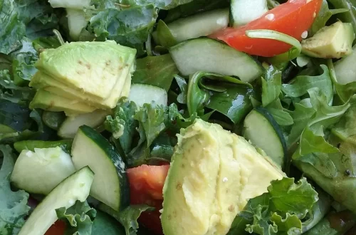 Panera-Inspired Seasonal Greens Salad with arugula, avocado, cucumber, tomato, and balsamic vinaigrette.