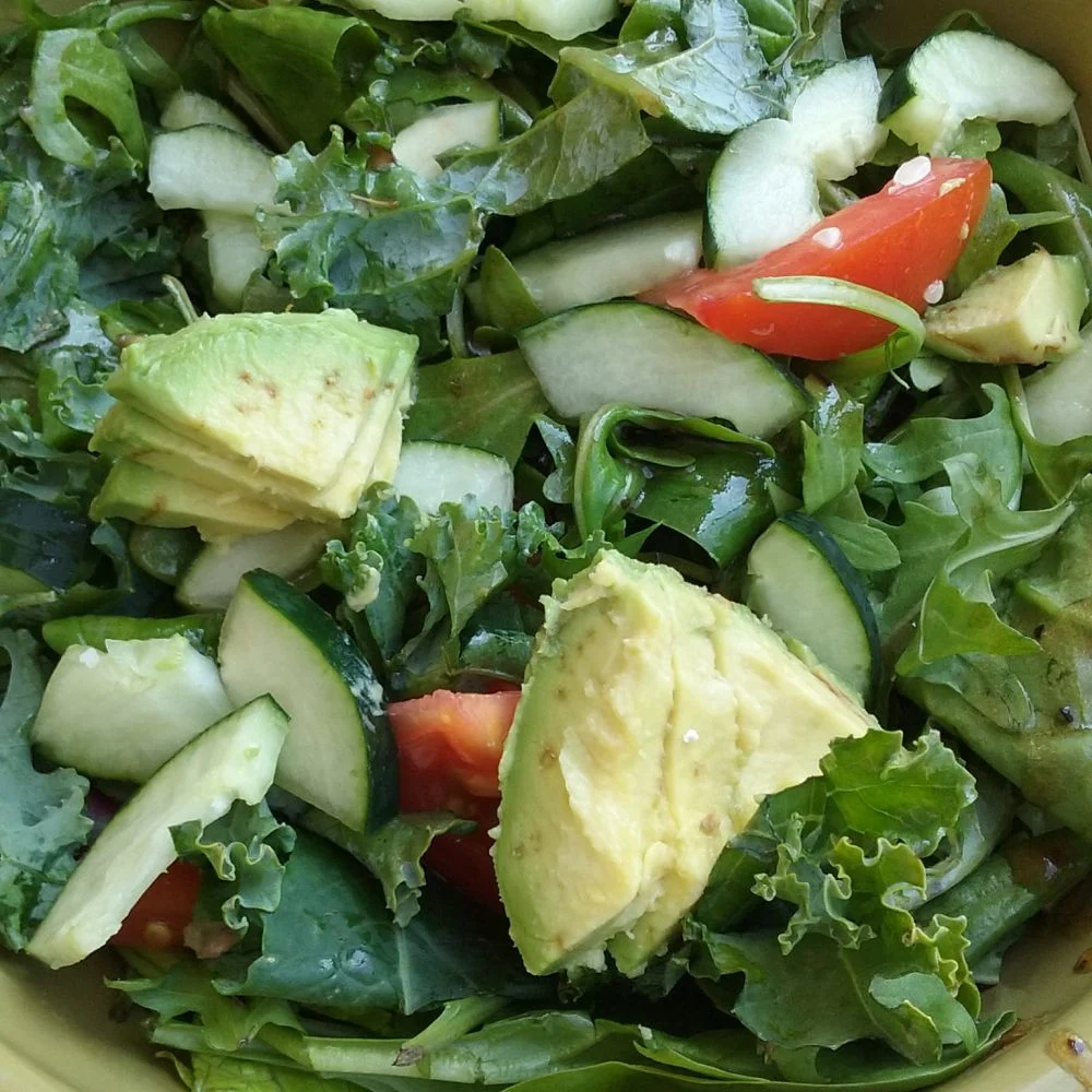 Panera-Inspired Seasonal Greens Salad with arugula, avocado, cucumber, tomato, and balsamic vinaigrette.