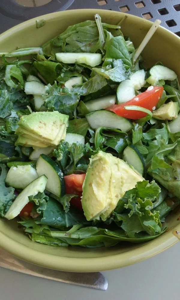 Panera-Inspired Seasonal Greens Salad with arugula, avocado, cucumber, tomato, and balsamic vinaigrette.