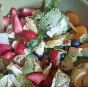 Panera Strawberry Poppyseed Salad with avocado, strawberries, pineapple, mandarin oranges, and poppyseed dressing.