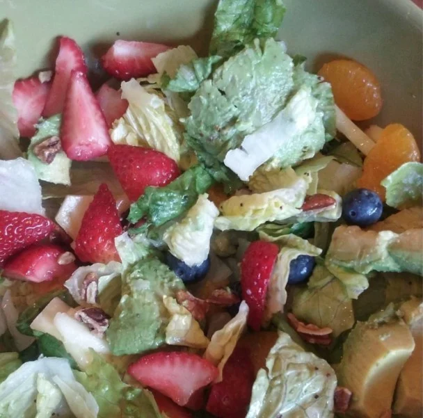 Panera Strawberry Poppyseed Salad with avocado, strawberries, pineapple, mandarin oranges, and poppyseed dressing.