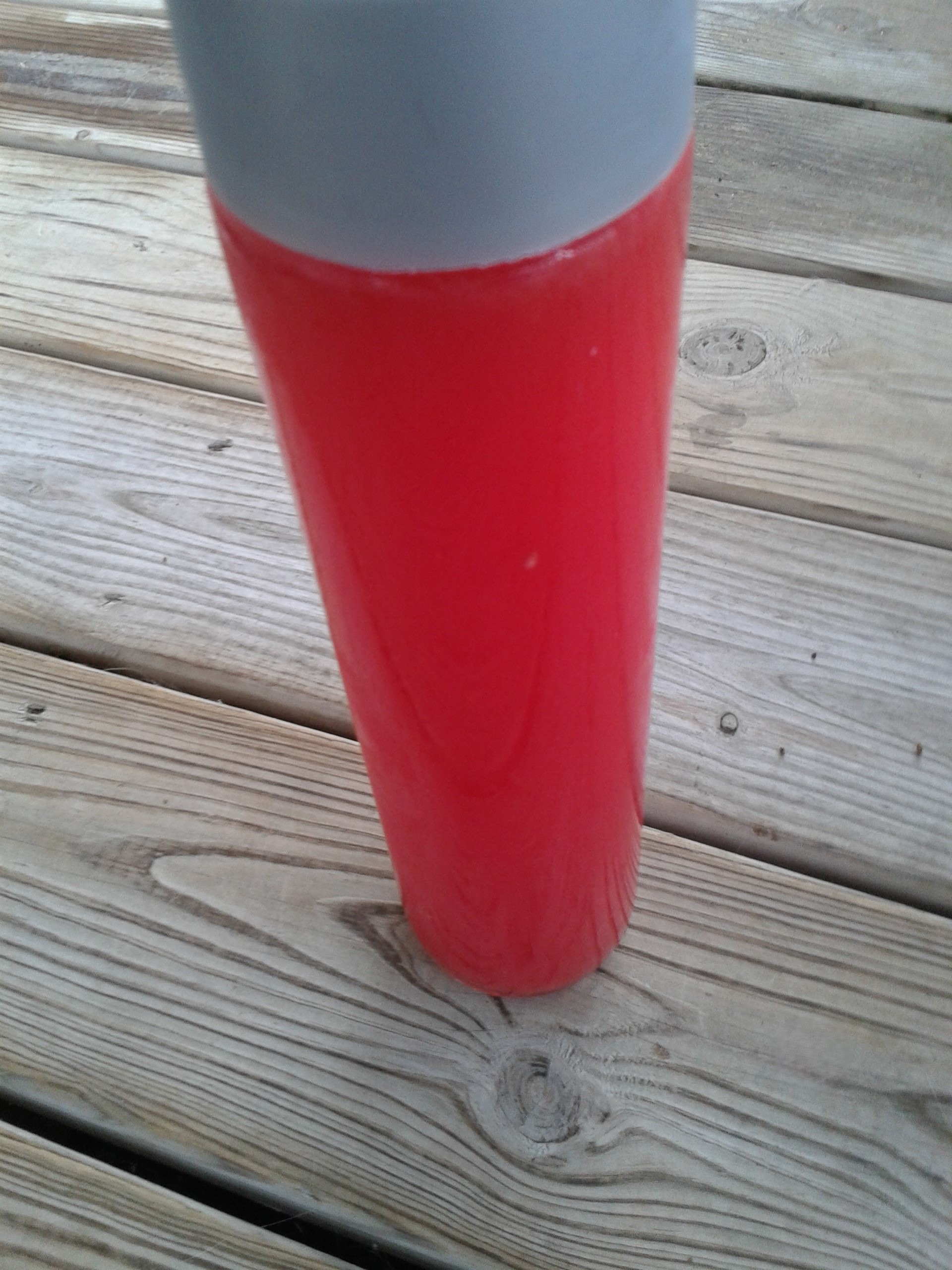 Watermelon Juice in a large Voss Water Bottle 2015 September 05 vertical view